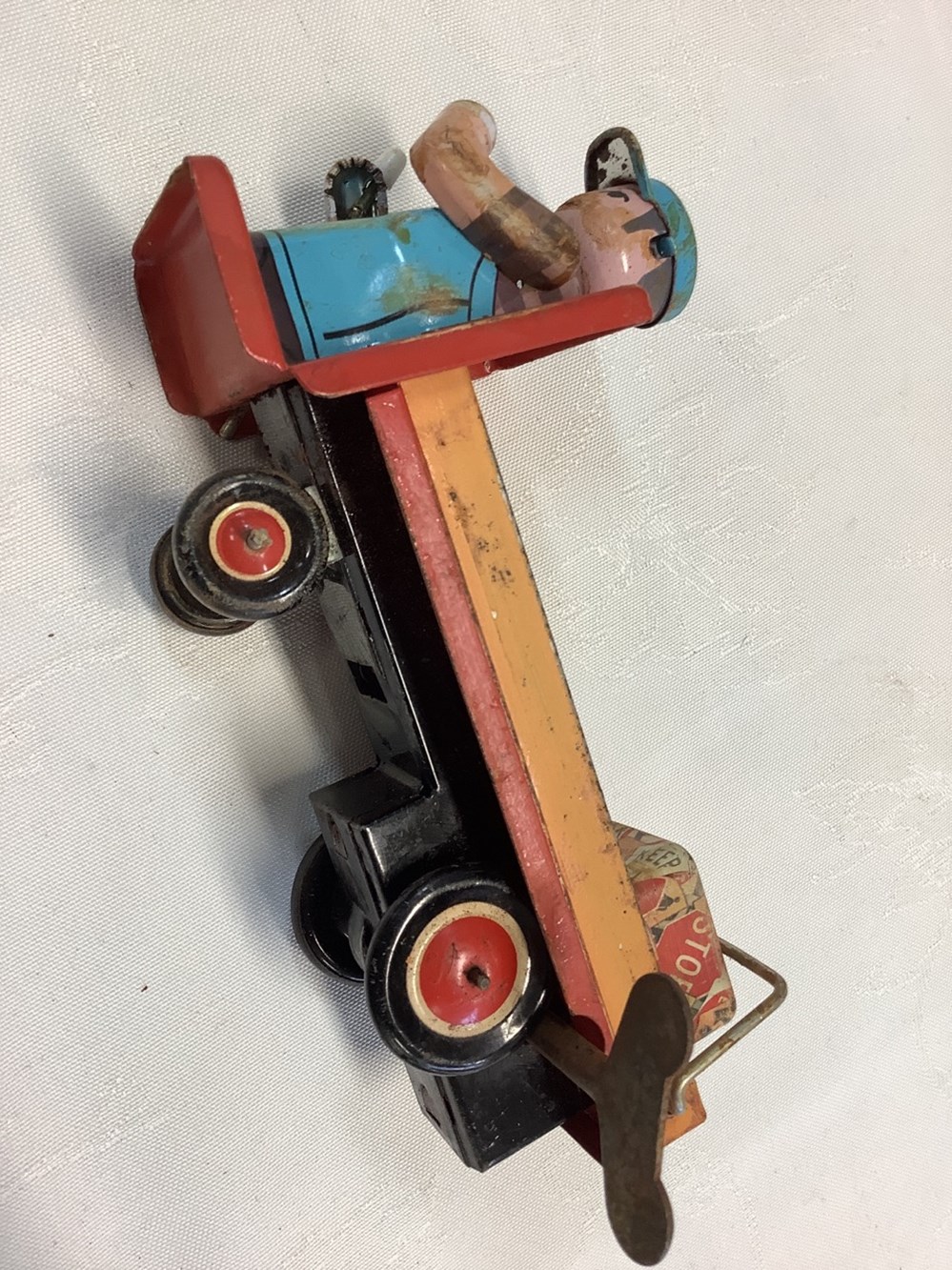 Jouet en tôle Dinky Supertoys, avec sa boîte et sa clef, fonctionnel, en l’état 3 monnaies jouet en tole dinky supertoys avec sa boite et sa clef fonctionnel en l etat