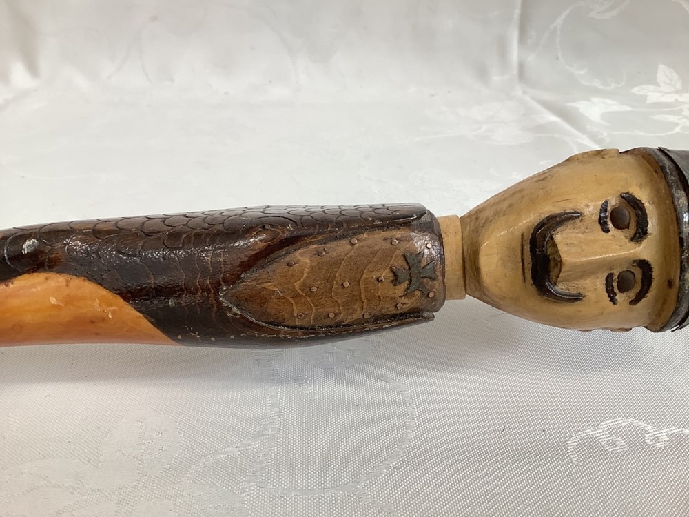 Canne avec un pommeau en tête de soldat prussien 3 monnaies canne avec un pommeau en tete de soldat prussien