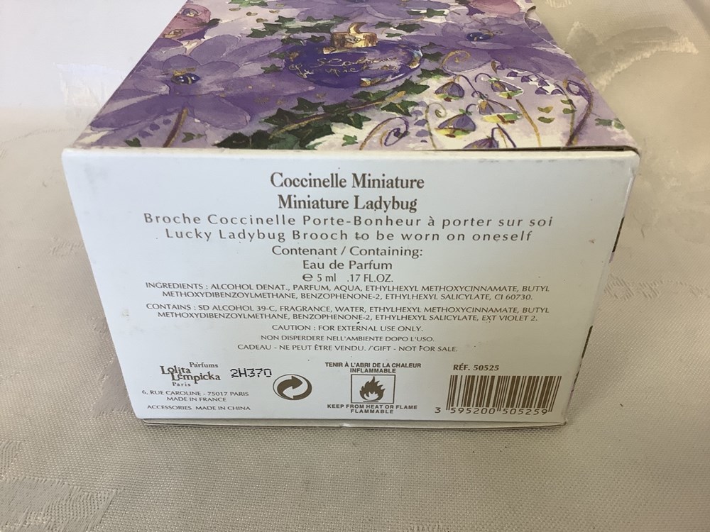 Coffret coccinelle miniature, eau de parfum Lolita Lempicka avec broche coccinelle Porte 3 monnaies coffret coccinelle miniature eau de parfum lolita lempicka avec broche coccinelle porte