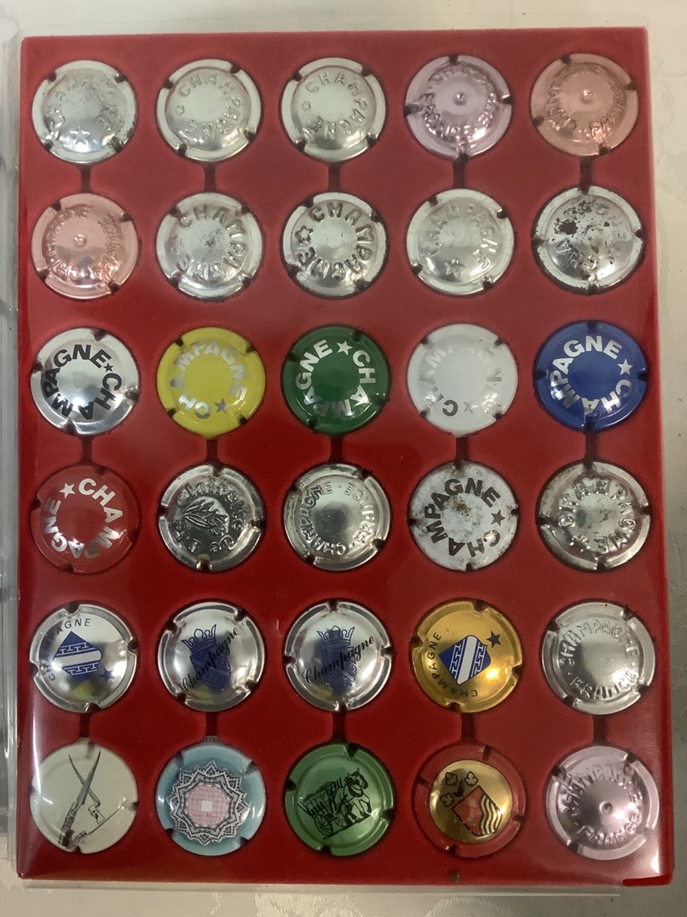 Lot de classeurs de capsules de Champagne 4 monnaies lot de classeurs de capsules de champagne