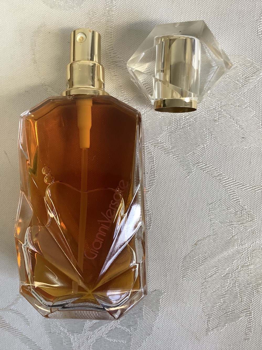 Eau de toilette Gianni Versace75 ml 2 monnaies eau de toilette gianni versace75 ml