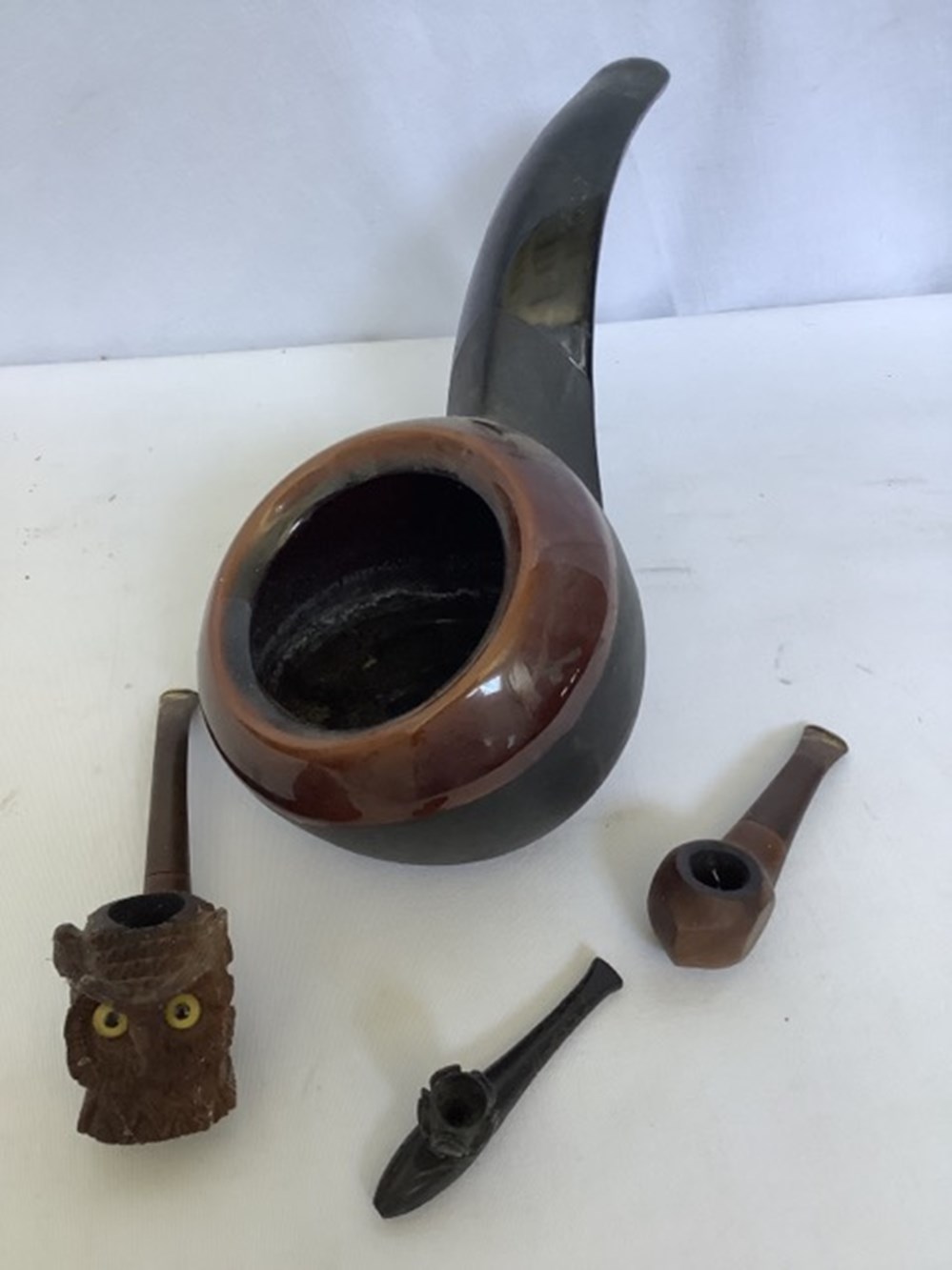 Important lot de pipes et porte pipes 4 monnaies important lot de pipes et porte pipes