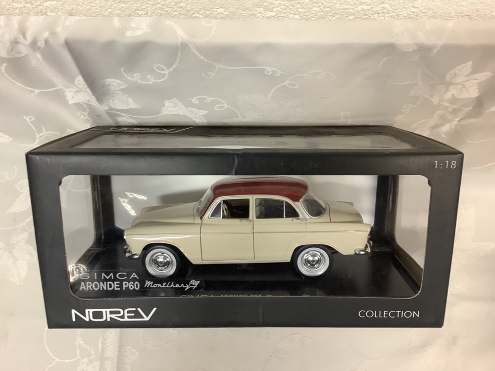 2 voitures en boîtes. Une simca aronde p60 Norev et la décapotable du Capitaine Haddock 4 monnaies 2 voitures en boites une simca aronde p60 norev et la decapotable du capitaine haddock