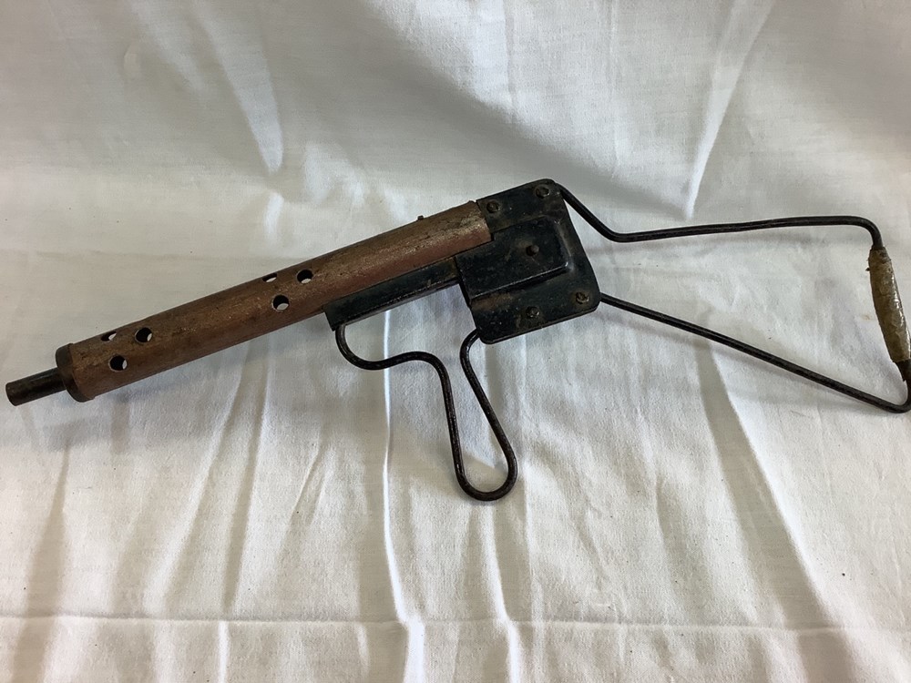 monnaies deux jouets anciens mitraillette et pistolet