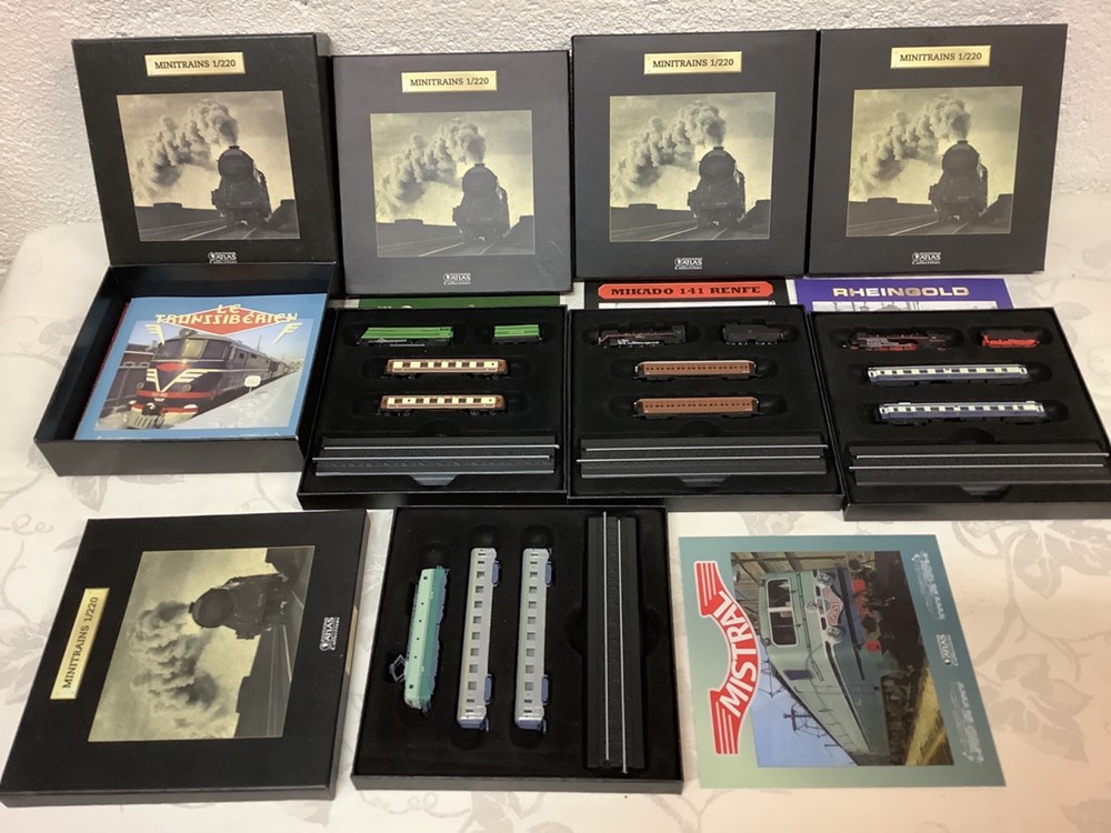 Lot de 4 mini trains collection Atlas avec coffrets et livrets, état neuf monnaies lot de 4 mini trains collection atlas avec coffrets et livrets etat neuf
