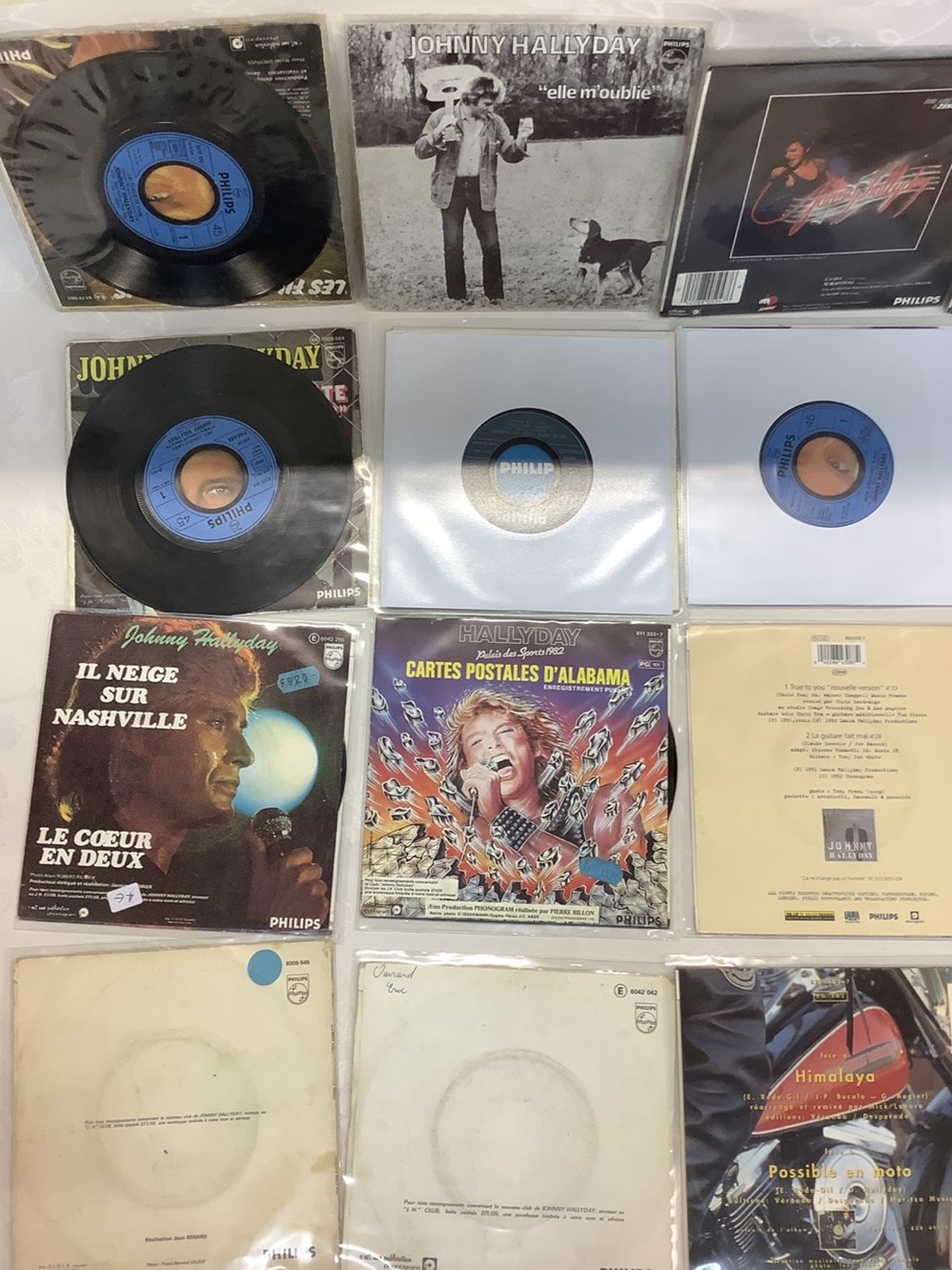 18 vinyles 45 T. 4 monnaies 18 vinyles 45 t