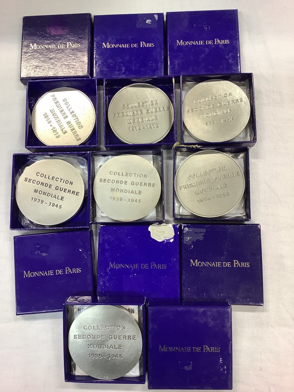 Lot de 7 médailles de table, Monnaie de Paris, collection 1ère et 2nde Guerre Mondiale, dont 3 avec leurs supports monnaies lot de 7 medailles de table monnaie de paris collection 1ere et 2nde guerre mondiale dont 3 avec leurs supports