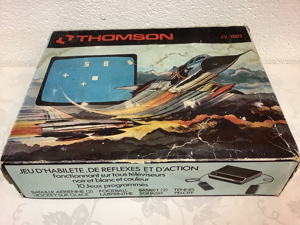 Console ThomsonJV 1002 dans sa boîte d’origine avec notice, transformateur et certificat de garantie 4 monnaies console thomsonjv 1002 dans sa boite d origine avec notice transformateur et certificat de garantie
