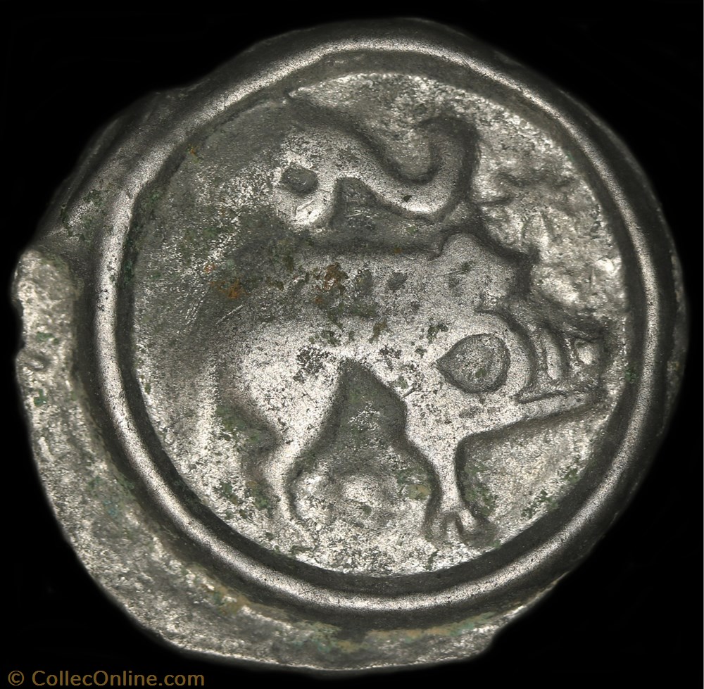 Potin au personnage assis de face - Type à l'astre 3 monnaie antique av jc ap gauloise potin au personnage assis de face type a astre