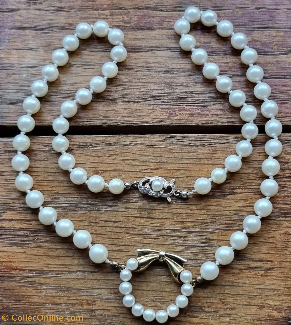 Pärlcollier med guldhänge art antiquities parlcollier med guldhange