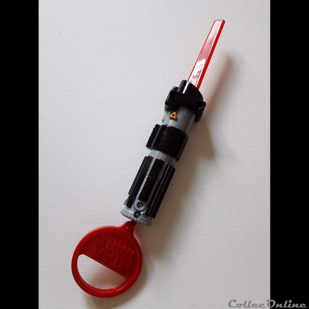 2008 - Mc Donald's - Star Wars - Sabre laser triangulaire rouge figurine cinema 2008 mc donals star wars sabre laser triangulaire rouge