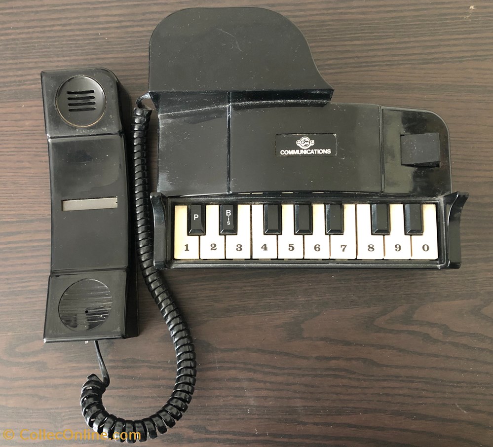 Téléphone Piano noir Comoc Communications, 1988. electro vintage telephones telephone piano noir comoc communications 1988