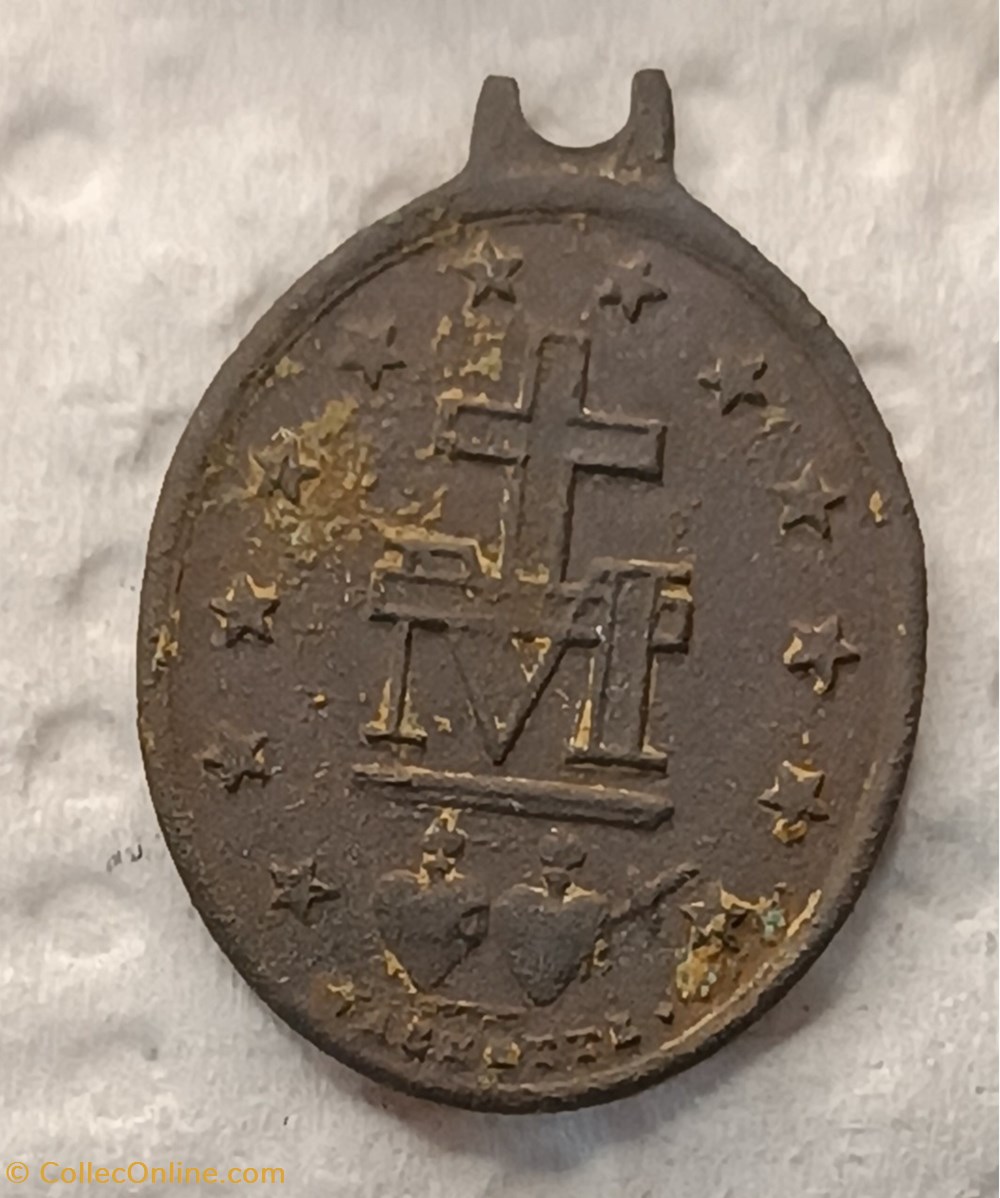 bijoux horlogerie divers 017 la medaille miraculeuse le retour du retour du retour
