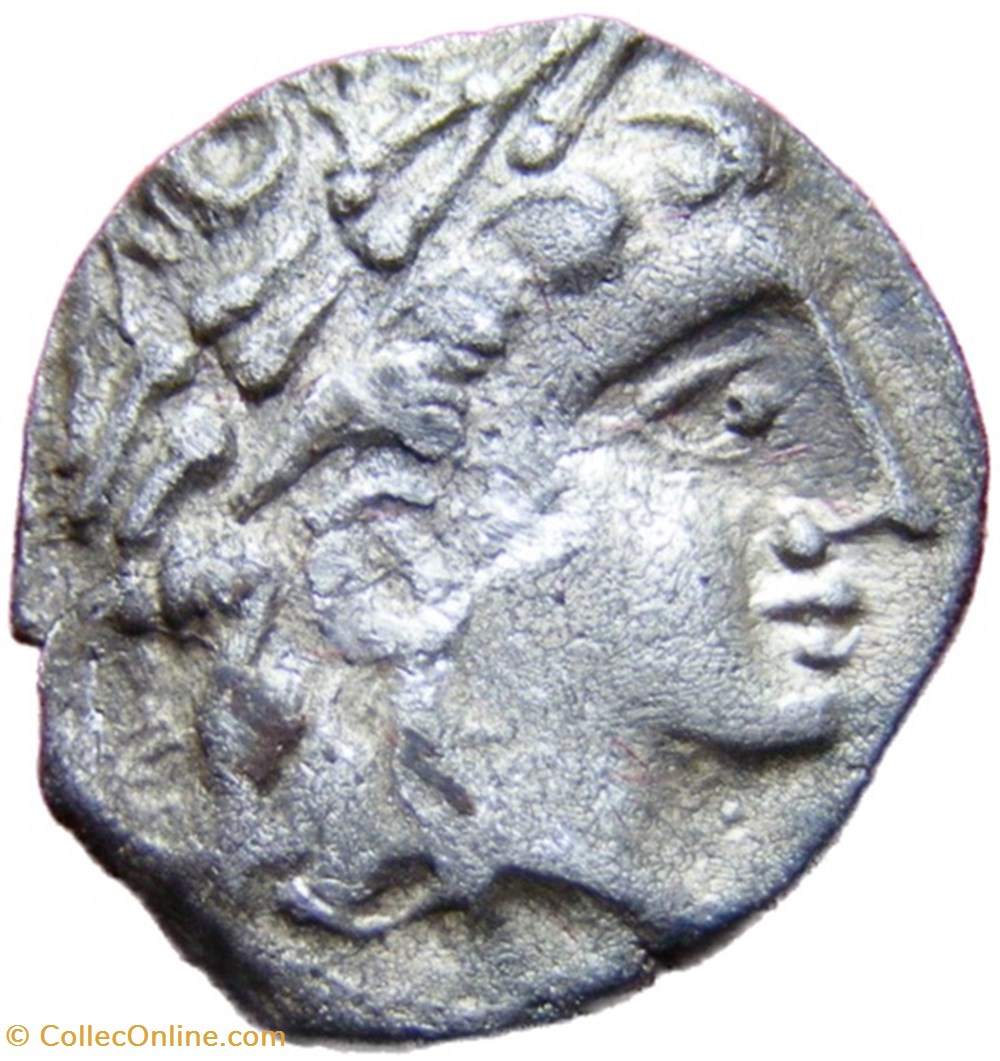 Drachme au cervidé et à la roue, tête à droite monnaies antiques celtes drachme au cervide et a la roue tete a droite