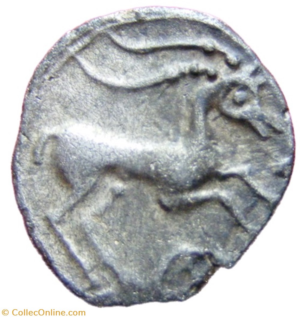 Drachme au cervidé et à la roue, tête à droite monnaies antiques celtes drachme au cervide et a la roue tete a droite