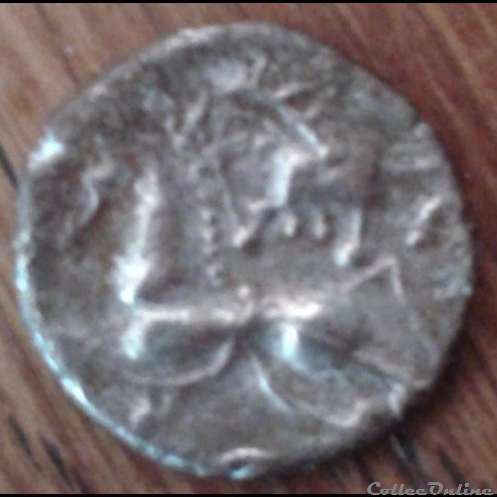 monnaie antique gauloise serie 1079 fraction a la tete coupee sur le cheval