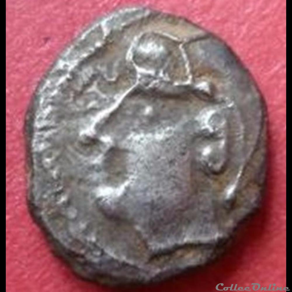 Série 1079 Drachme à la tête coupée sur le cheval monnaie antique gauloise serie 1079 drachme a la tete coupee sur le cheval