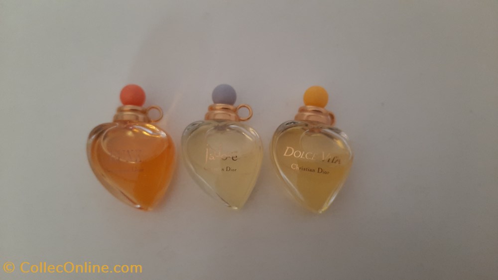 DIOR: Miniature Pendentifs: DUNE, J'ADORE et DOLCE VITA parfums beaute dior miniature pendentifs dune adore et dolce vita