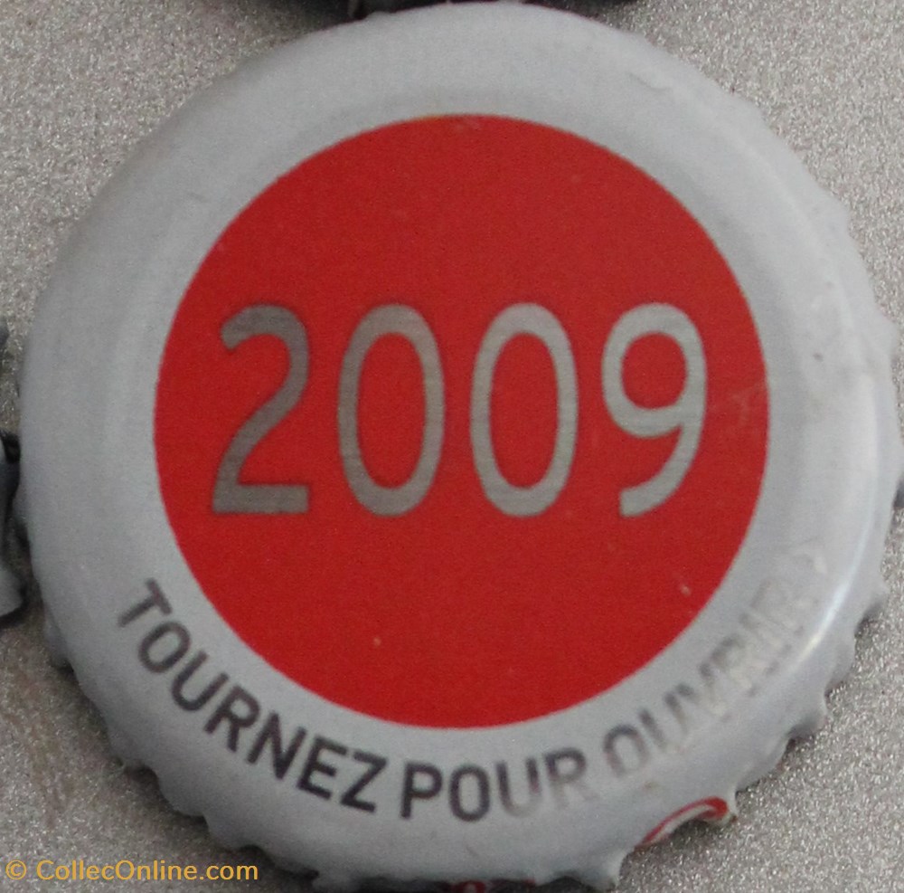 Série grise 2009 capsules muselets biere 2009 texte gris argente sur fond rouge 70eme anniversaire 1947 2017 brasserie kronembourg france