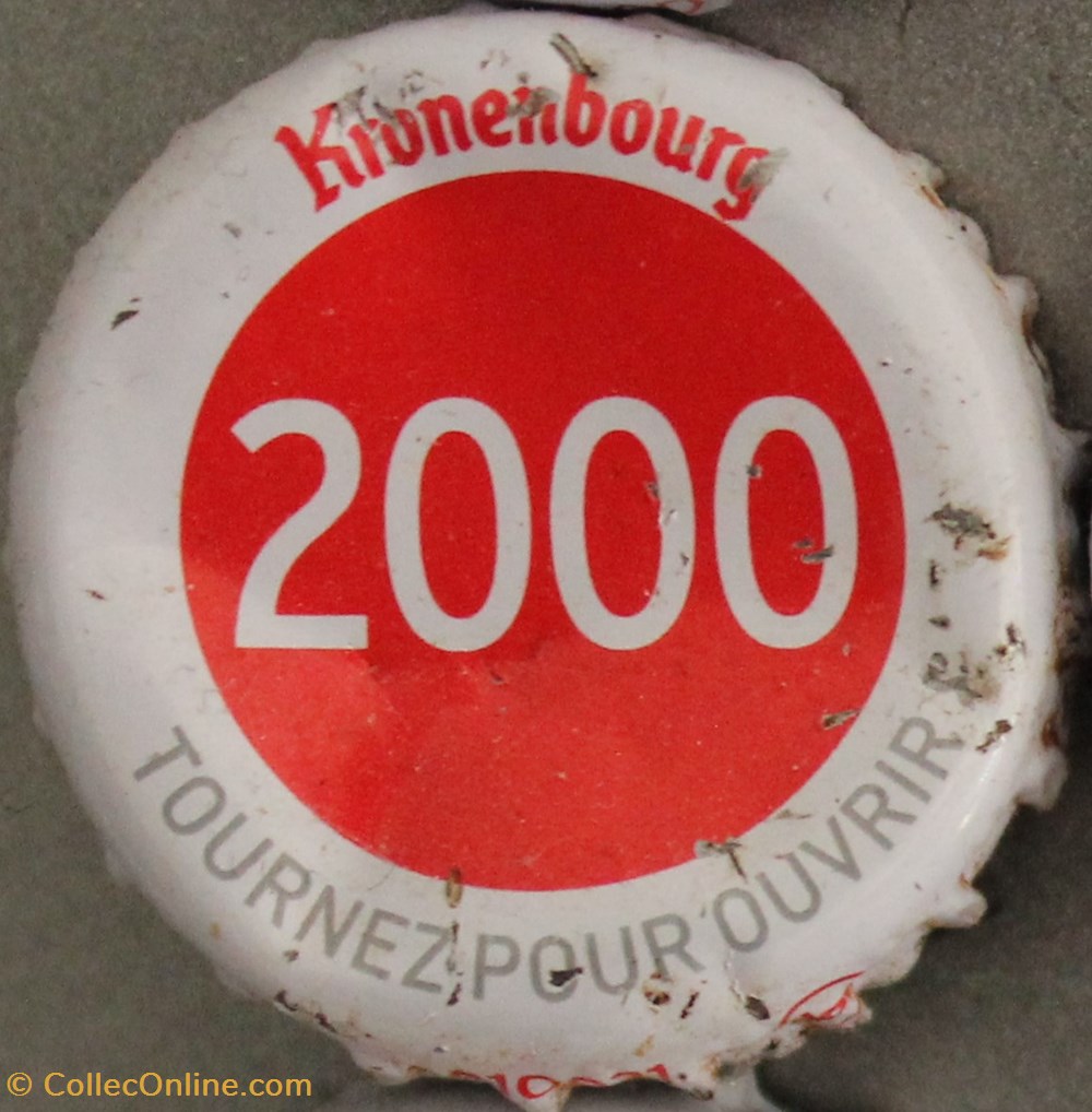 Série blanche 2000 capsules muselets biere 2000 texte blanc sur fond rouge 70eme anniversaire 1947 2017 brasserie kronembourg france