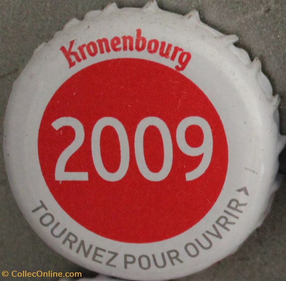 Série blanche 2009 capsules muselets biere 2009 texte blanc sur fond rouge 70eme anniversaire 1947 2017 brasserie kronembourg france