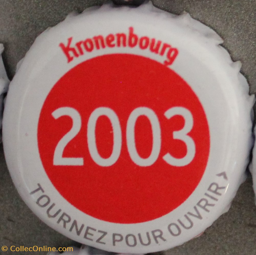 Série blanche 2003 capsules muselets biere 2003 texte blanc sur fond rouge 70eme anniversaire 1947 2017 brasserie kronembourg france