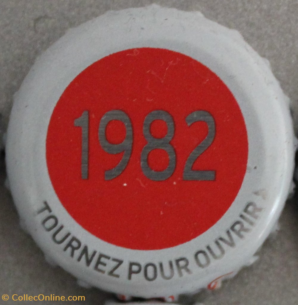 Série grise 1982 capsules muselets biere 1982 texte gris argente sur fond rouge 70eme anniversaire 1947 2017 brasserie kronembourg france