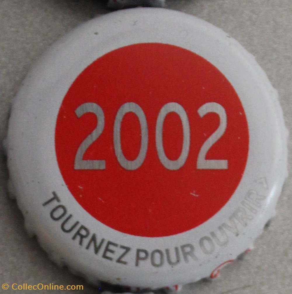 Série grise 2002 capsules muselets biere 2002 texte gris argente sur fond rouge 70eme anniversaire 1947 2017 brasserie kronembourg france