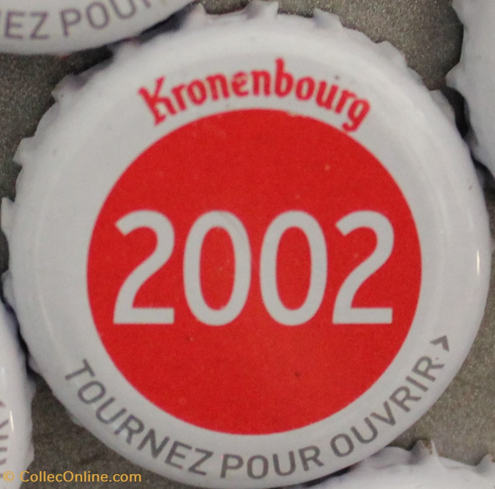 Série blanche 2002 capsules muselets biere 2002 texte blanc sur fond rouge 70eme anniversaire 1947 2017 brasserie kronembourg france