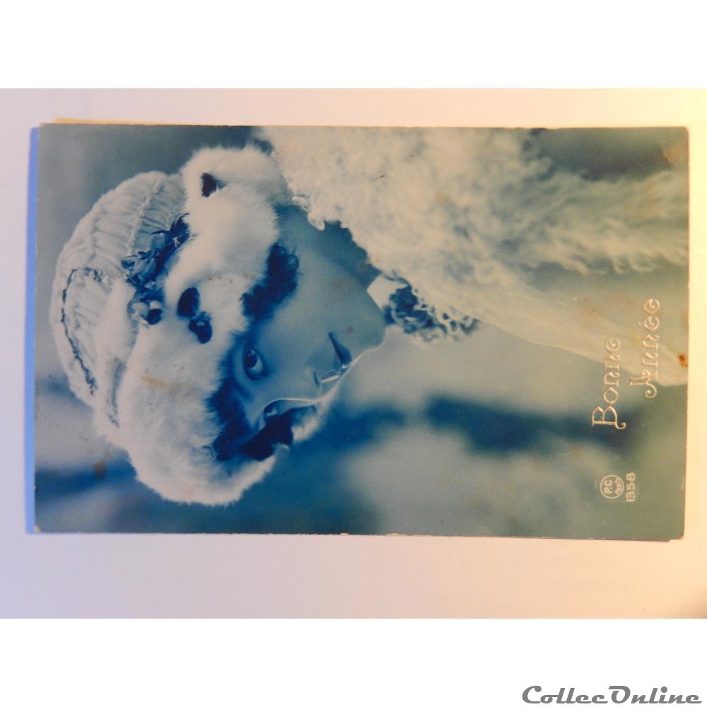 carte postale franche comte cpa de bonne annee femme en hiver