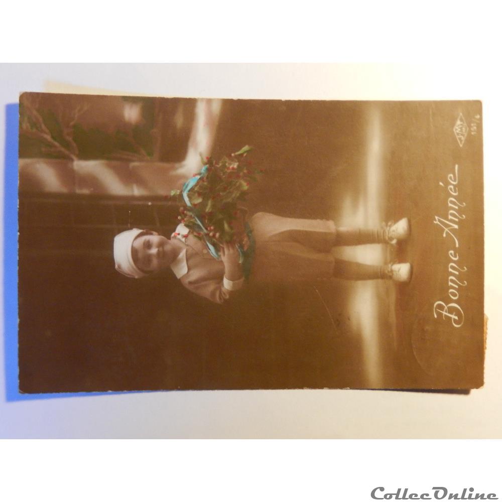 carte postale bretagne cpa de bonne annee fille avec bouquet de fleurs