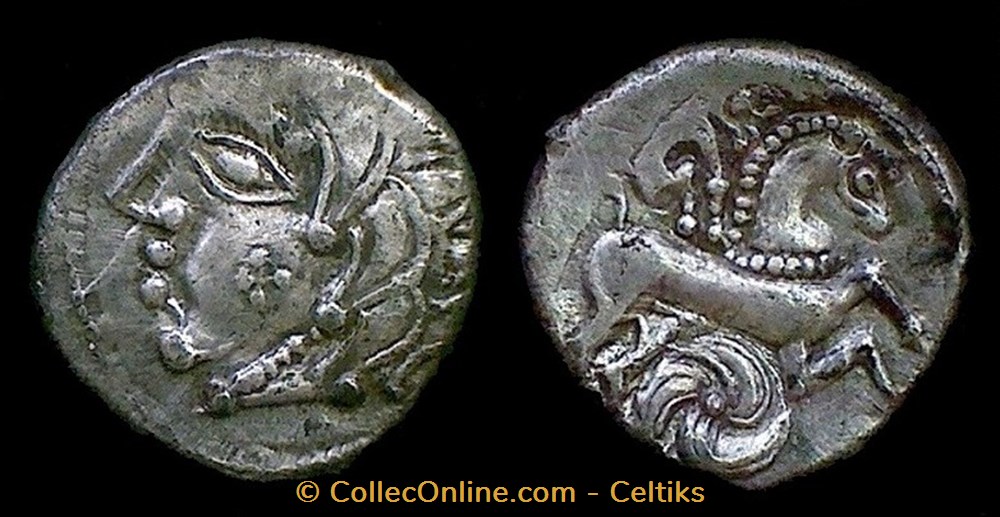drachme au loup au et au cheval , joue tatouée monnaies antiques celtes drachme au loup au et au cheval joue tatouee