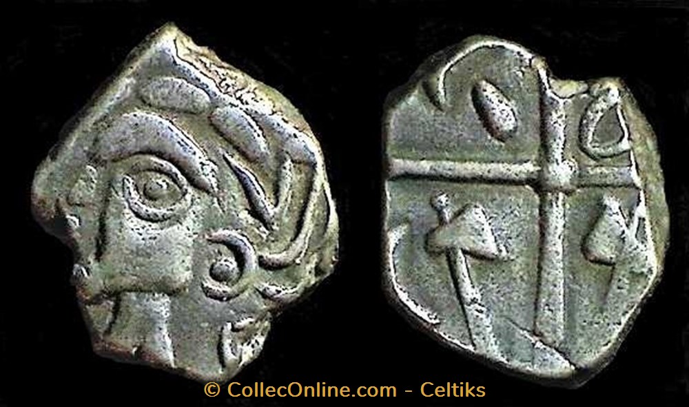 drachme à la tête cubiste aux haches affrontées monnaies antiques celtes drachme a la tete cubiste aux haches affrontees