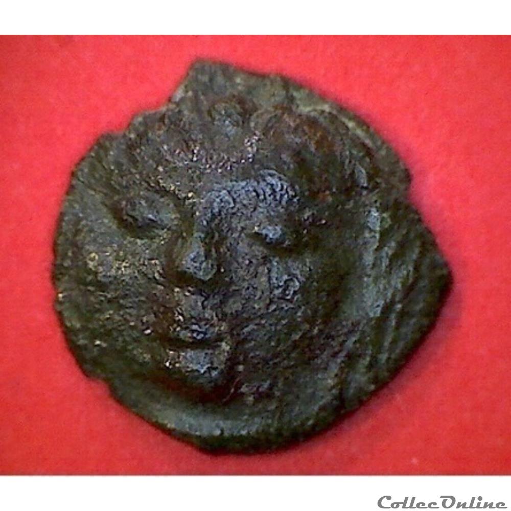 série989 DT 3276 bronze SECISV à la tête de face monnaie antique gauloise serie989 dt 3276 bronze secisv a la tete de face