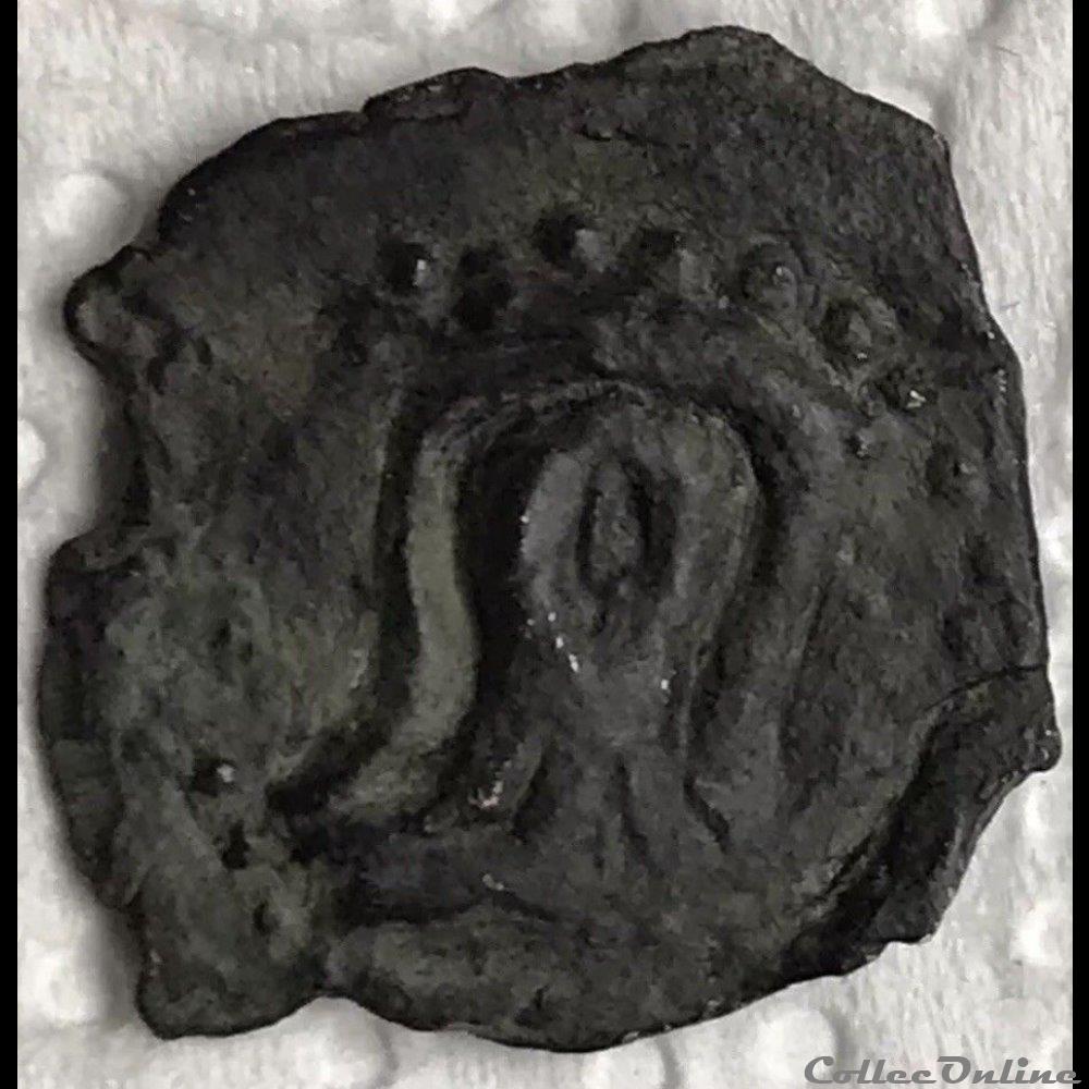bronze à la tête de face et au cavalier monnaie antique gauloise bronze a la tete de face et au cavalier
