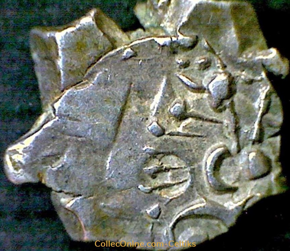 monnaies antiques celtes drachme a la tete triangulaire