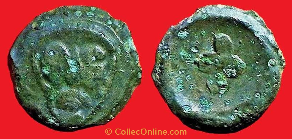 monnaies antiques celtes bronze a la tete de face et au swastika