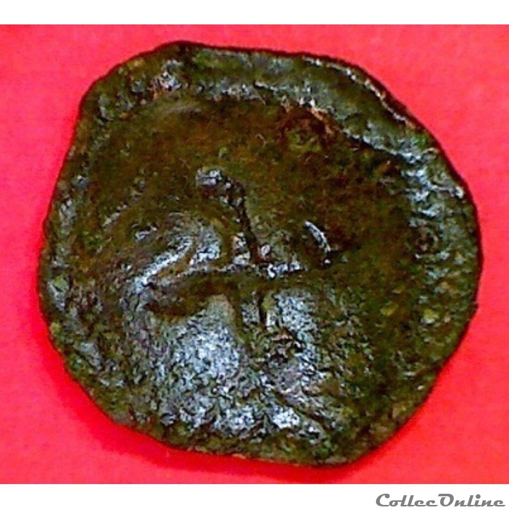 Série 47 DT 406 bronze à la tête de face et au swastika (incertain PARISII ) monnaie antique gauloise serie 47 dt 406 bronze a la tete de face et au swastika incertain parisii