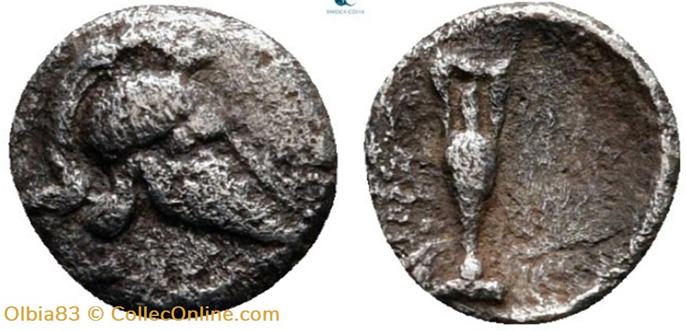 Néandria / Tétartemorion / Casque avec cimiez à droite - Amphore dans un rond creux. monnaies antiques grecques neandria tetartemorion casque avec cimiez a droite amphore dans un rond creux