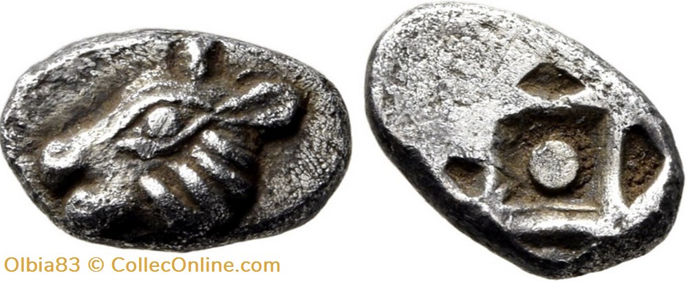 Asie Mineure / Incertaine / Tête de taureau - Carré en forme de losange avec une pastille centrale monnaies antiques grecques asie mineure incertaine tete de taureau carre en forme de losange avec une pastille centrale