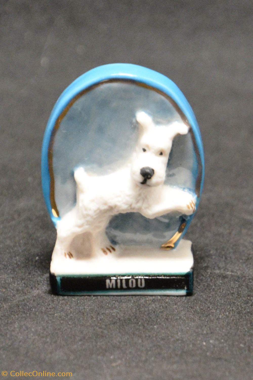 Série "Tintin" - Milou - 01 divers feves serie tintin milou 01