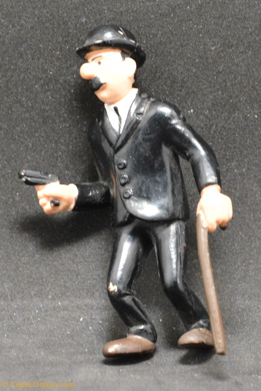 Plastoy - 1994 - 8,5cm - Dupond avec sa canne et son pistolet figurines plastoy 1994 8 5cm dupond avec sa canne et son pistolet