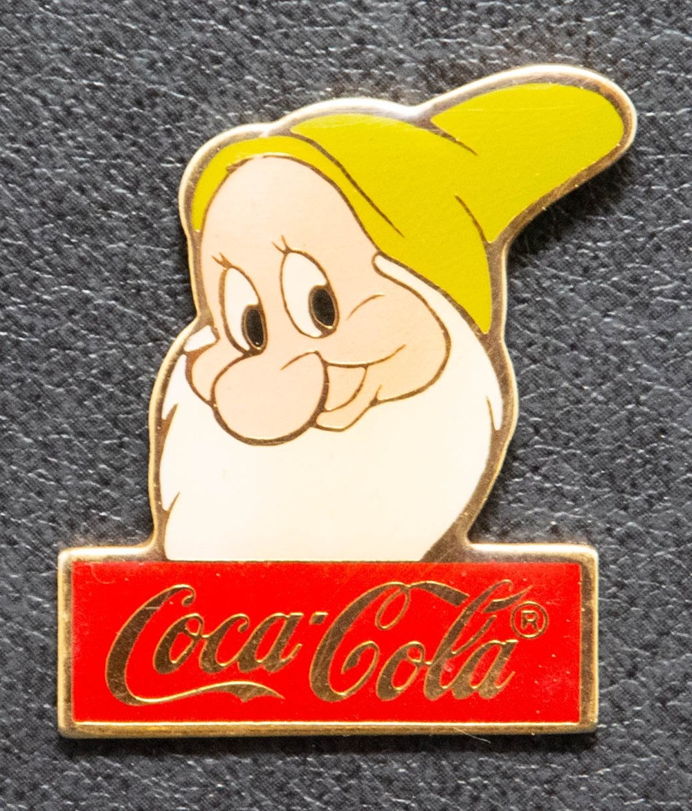 divers pin badges coca cola bashful