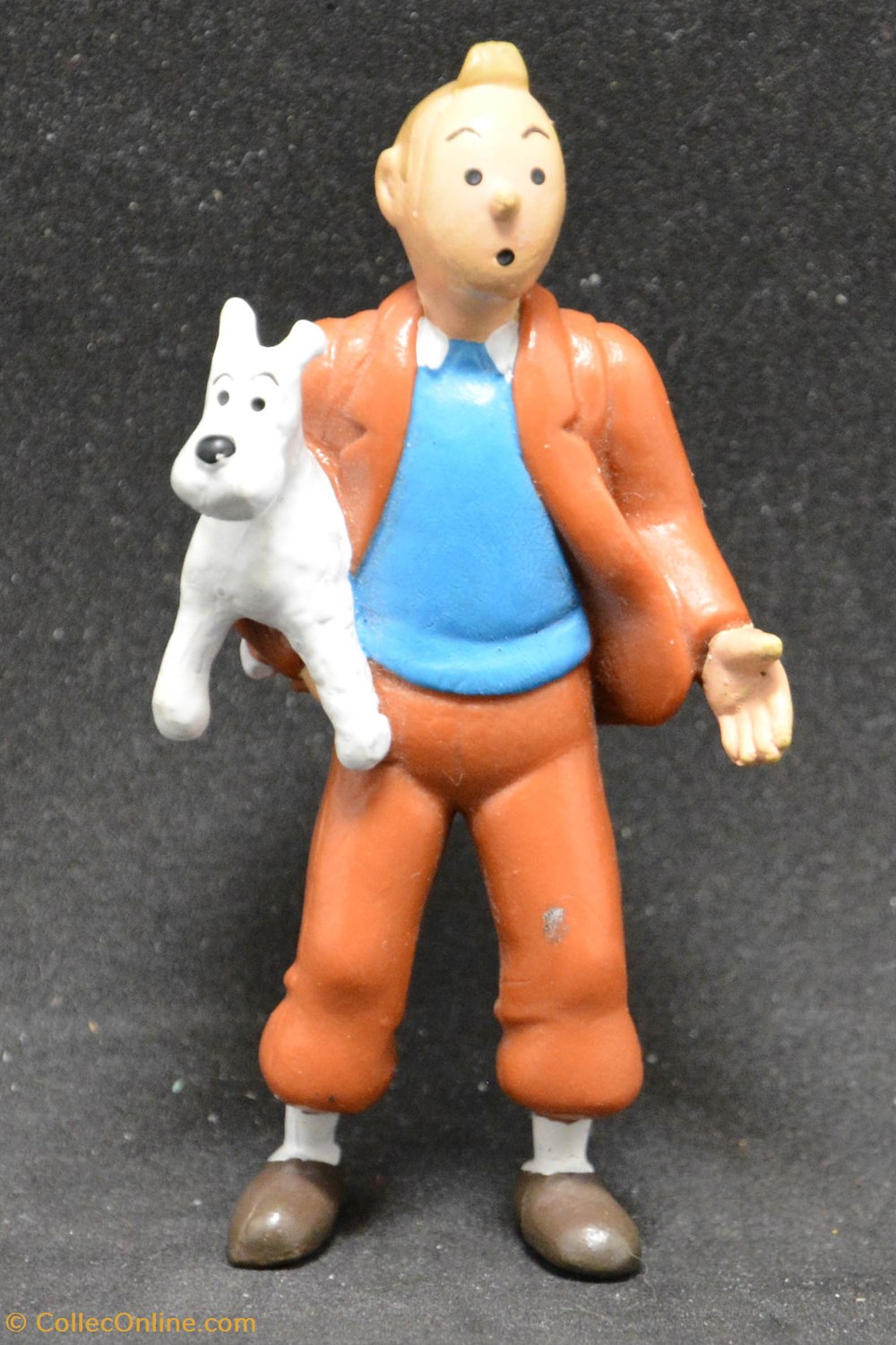 Plastoy - 1994 - 8,5cm - Tintin portant Milou figurines plastoy 1994 8 5cm tintin portant milou