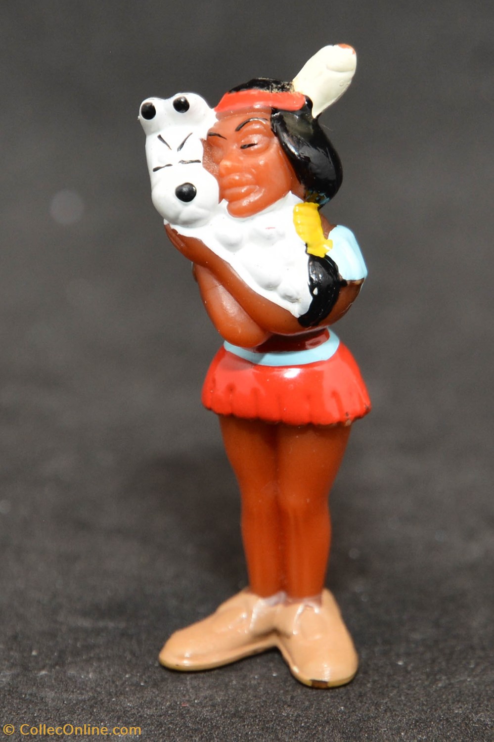 Série 02 - Astérix en amérique - 1997 - 04 - Indienne tenant Idéfix dans ses bras figurines serie 02 asterix en amerique 1997 04 indienne tenant idefix dans ses bras