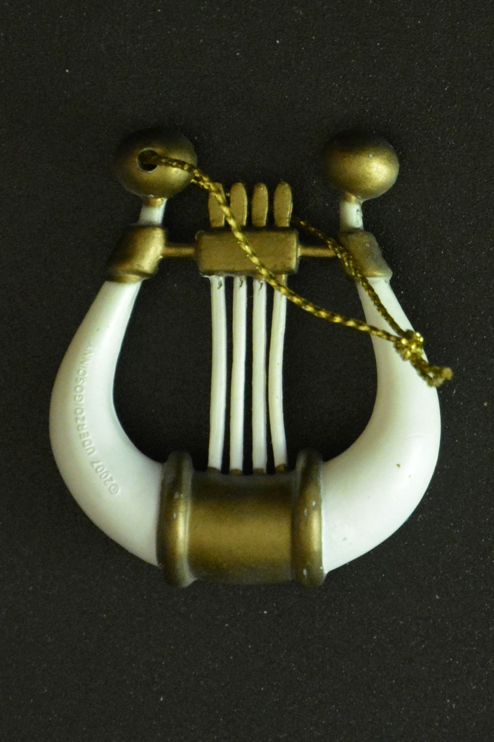 Calendrier de l'avent - 2007 - Jacquot - Lyre d'Assurancetourix divers calendrier de avent 2007 jacquot lyre assurancetourix