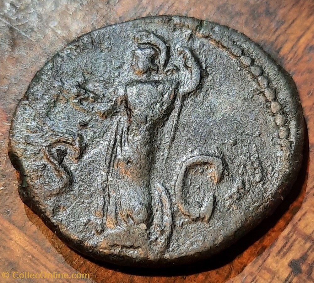 Domitien A / Tete lauree a d R / Minerve debout a g -80-81 D 26.6 P 8.74g C 441 RIC 169c monnaie antique av jc ap romaine republicaine imperiale domitien a tete lauree a d r minerve debout a g 80 81 d 26 6 p 8 74g c 441 ric 169c