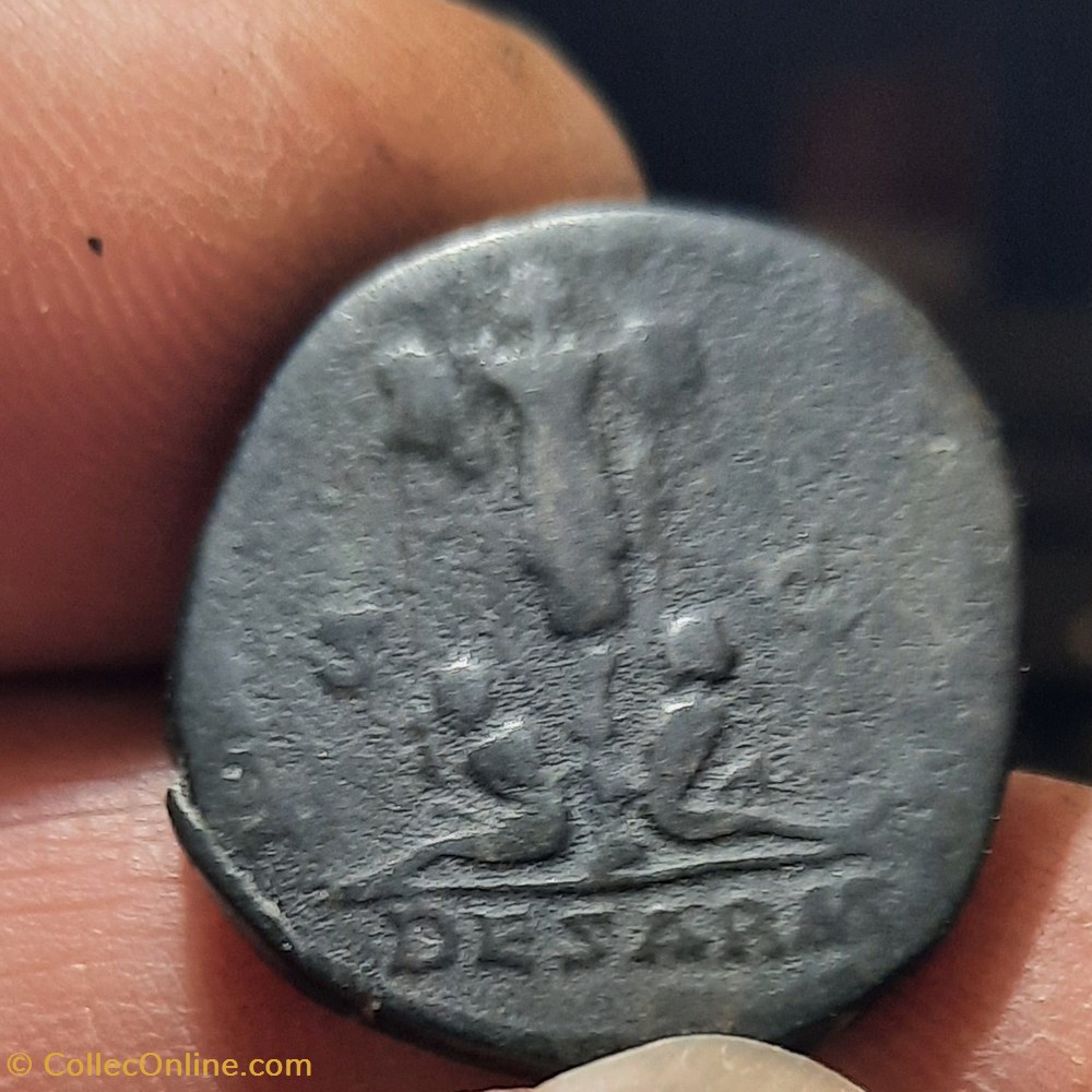 Marc Aurele A/Tete radiee a d R/ Trophee D23.5 P 11.78g C168 RIC 1186 monnaies antiquite av jc ap romaines republicaines imperiales marc aurele a tete radiee a d r trophee d23 5 p 11 78g c168 ric 1186