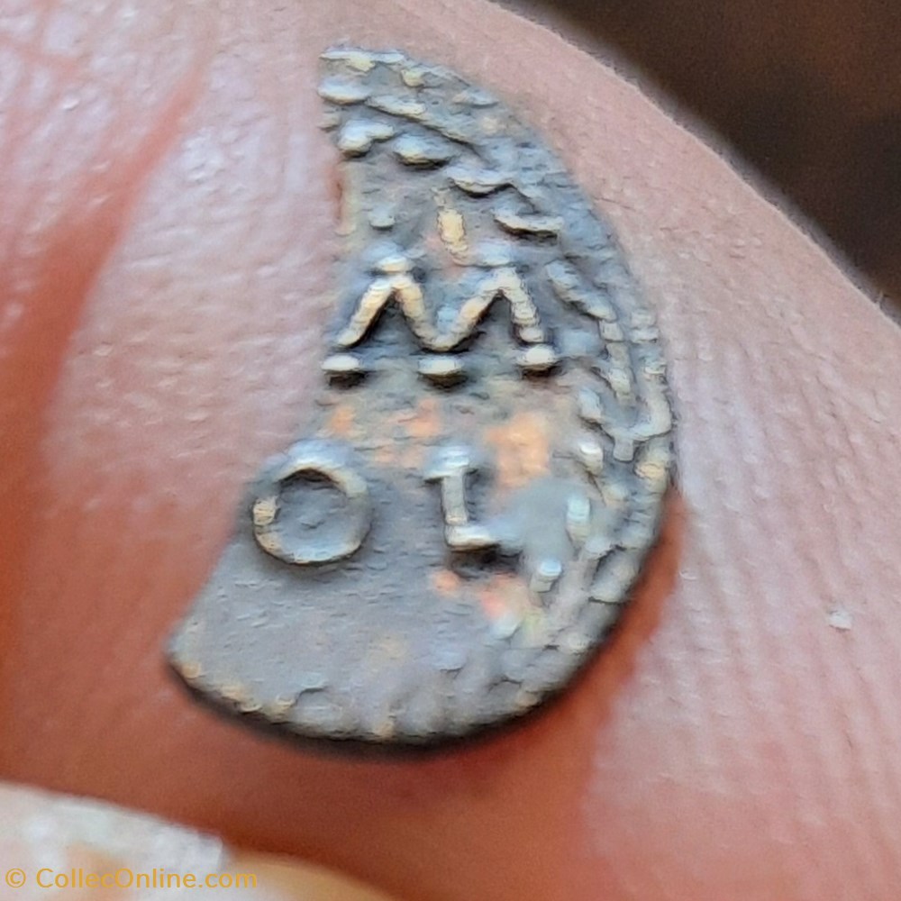 Obole cassee en deux A/ Tete casquee a d R/Couronne D11.6 P 0.29g Feugere 2718 monnaies antiquite av jc ap gauloises obole cassee en deux a tete casquee a d r couronne d11 6 p 0 29g feugere 2718