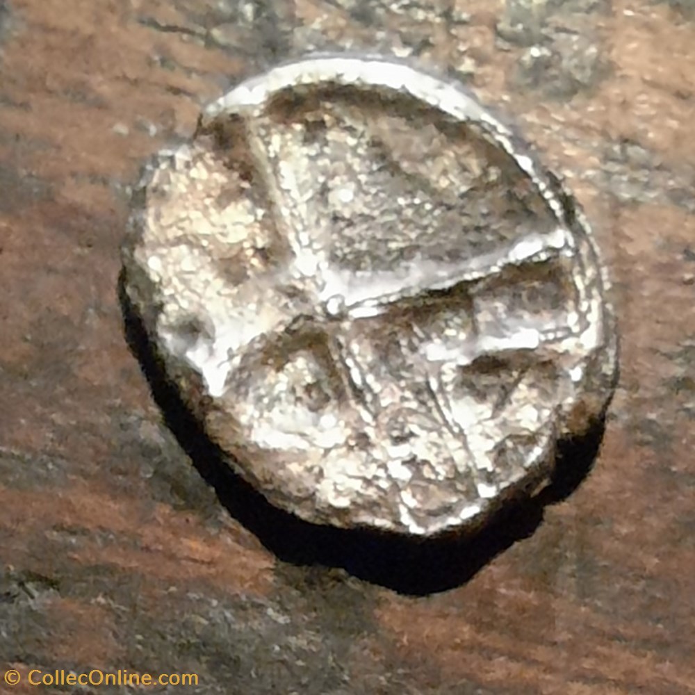 Marseille A/Tete Apollon a g R/Roue MA -300-100 D9.2 P0.48 Feugere OBM 10a monnaie antique av jc gauloise marseille a tete apollon a g r roue ma 300 100 d9 2 p0 48 feugere obm 10a